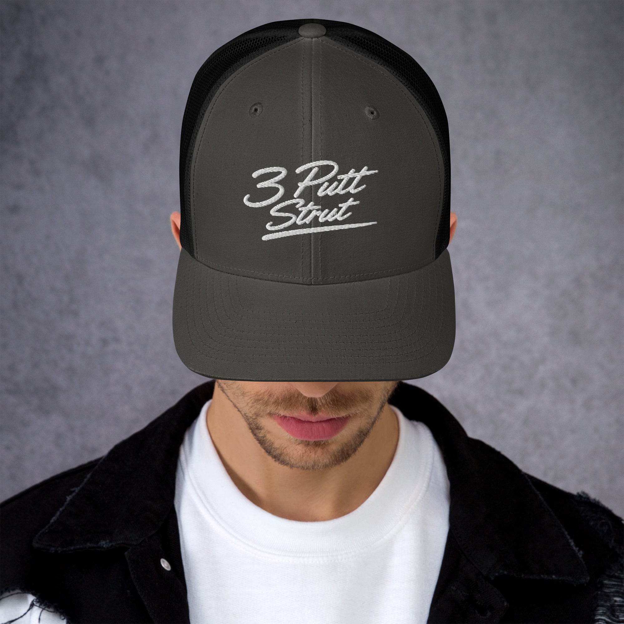 3 Putt Strut charcoal trucker hat, alternate front view