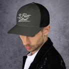 3 Putt Strut charcoal trucker hat, left side