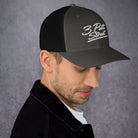 3 Putt Strut charcoal trucker hat, right side