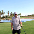 Golfer wearing the Three Putt Strut two-tone hat on the course